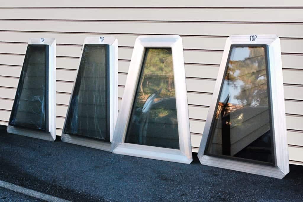 Four custom trapezoid shaped skylights ready for istallation